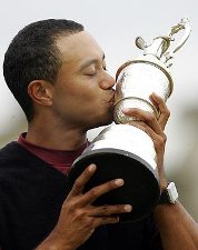 Tiger Woods lifts the Claret Jug at St Andrews Open 2005